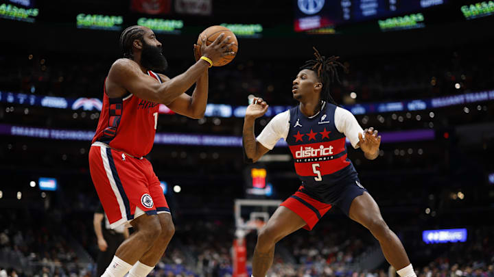 Jan 19, 2026; Washington, District of Columbia, USA; LA Clippers guard James Harden (1) prepares to shoot as Washington Wizards guard Jamir Watkins (5) defends in the second half at Capital One Arena. Mandatory Credit: Geoff Burke-Imagn Images