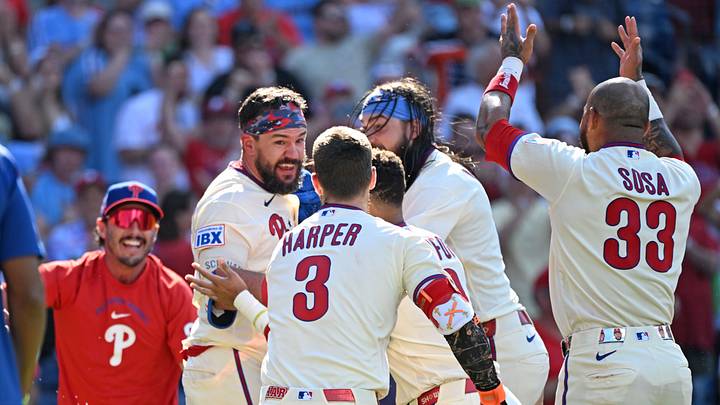 Aug 23, 2026; Philadelphia, Pennsylvania, USA; Philadelphia Phillies designated hitter Kyle Schwarber (12) celebrates his walk-off two-run home run with teammates during the ninth inning against the St. Louis Cardinals at Citizens Bank Park. Mandatory Credit: Eric Hartline-Imagn Images Aug 23, 2026; Philadelphia, Pennsylvania, USA; Philadelphia Phillies designated hitter Kyle Schwarber (12) celebrates his walk-off two-run home run with teammates during the ninth inning against the St. Louis Cardinals at Citizens Bank Park. Mandatory Credit: Eric Hartline-Imagn Images