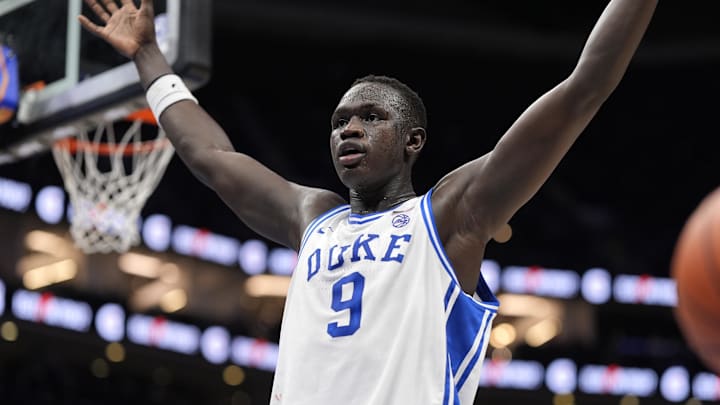 Mar 15, 2025; Charlotte, NC, USA; Duke Blue Devils center Khaman Maluach (9) reacts after a play in the first half of the 2025 ACC Conference Championship game against the Louisville Cardinals at Spectrum Center. Mandatory Credit: Jim Dedmon-Imagn Images Mar 15, 2025; Charlotte, NC, USA; Duke Blue Devils center Khaman Maluach (9) reacts after a play in the first half of the 2025 ACC Conference Championship game against the Louisville Cardinals at Spectrum Center. Mandatory Credit: Jim Dedmon-Imagn Images