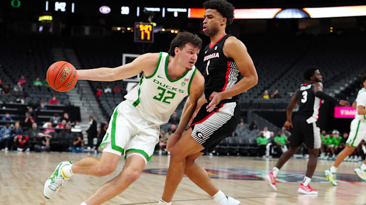 Nov 6, 2023; Las Vegas, Nevada; Oregon Ducks center Nate Bittle (32) dribbles against Georgia.