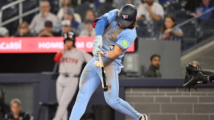 Toronto Blue Jays third baseman Addison Barger (47) hits a single against the Boston Red Sox in the second inning at Rogers Centre in 2024. Toronto Blue Jays third baseman Addison Barger (47) hits a single against the Boston Red Sox in the second inning at Rogers Centre in 2024.