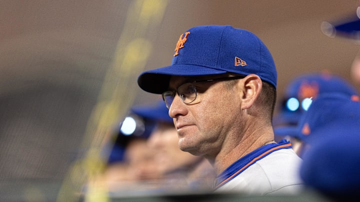 Apr 4, 2026; San Francisco, California, USA; New York Mets manager Carlos Mendoza watches his team take on the San Francisco Giants during the ninth inning at Oracle Park. Mandatory Credit: D. Ross Cameron-Imagn Images