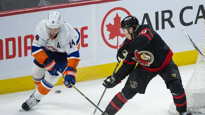 Mar 19, 2026; Ottawa, Ontario, CAN; Ottawa Senators defenseman Jordan Spence (10) moves the puck away from New York Islanders center Bo Horvat (14) in the third period at the Canadian Tire Centre. Mandatory Credit: Marc DesRosiers-IMAGN Images Mar 19, 2026; Ottawa, Ontario, CAN; Ottawa Senators defenseman Jordan Spence (10) moves the puck away from New York Islanders center Bo Horvat (14) in the third period at the Canadian Tire Centre. Mandatory Credit: Marc DesRosiers-IMAGN Images