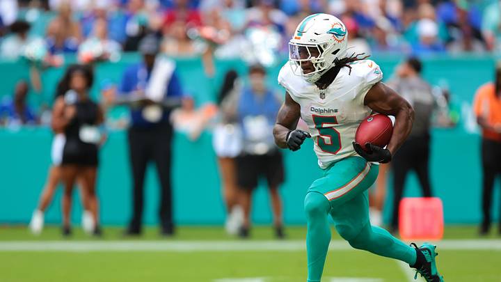 Miami Dolphins running back Jaylen Wright (5) returns the football against the New York Giants during the first half at Hard Rock Stadium. Miami Dolphins running back Jaylen Wright (5) returns the football against the New York Giants during the first half at Hard Rock Stadium.