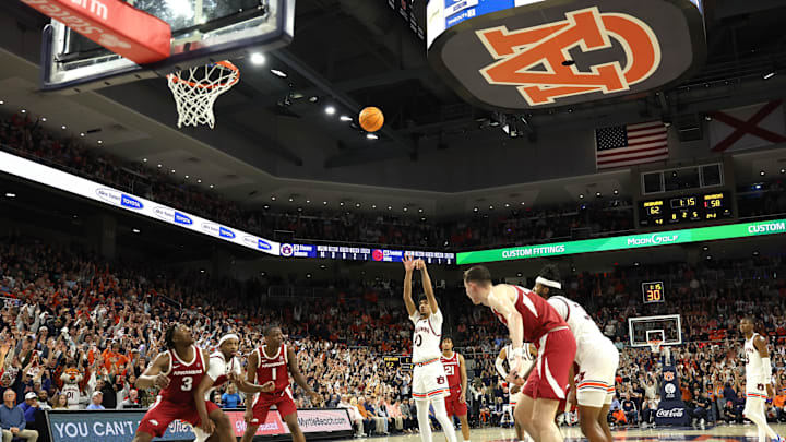 Feb 19, 2025; Auburn, Alabama, USA;  Auburn Tigers guard Chad Baker-Mazara (10) attempts a free throw against the Arkansas Razorbacks during the second half at Neville Arena. Mandatory Credit: John Reed-Imagn Images