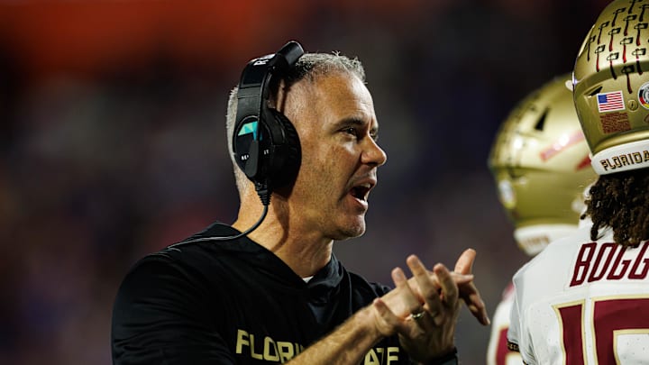 Nov 29, 2025; Gainesville, Florida, USA; Florida State Seminoles head coach Mike Norvell gestures against the Florida Gators during the second half at Ben Hill Griffin Stadium. Mandatory Credit: Matt Pendleton-Imagn Images