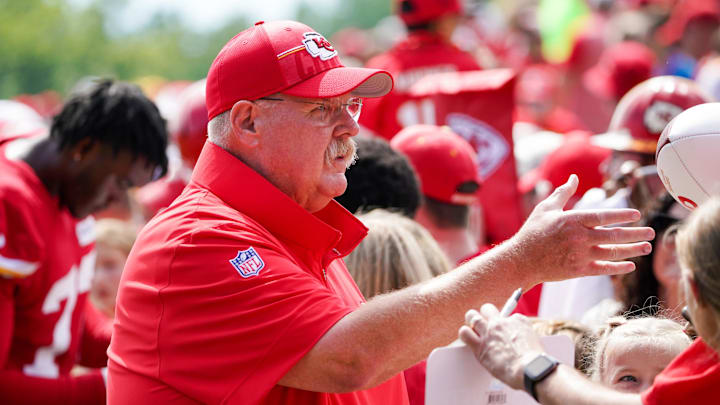 Jul 24, 2023; St. Joseph, MO, USA; Kansas City Chiefs head coach Andy Reid signs autographs for fans during training camp at Missouri Western State University. Mandatory Credit: Denny Medley-Imagn Images
