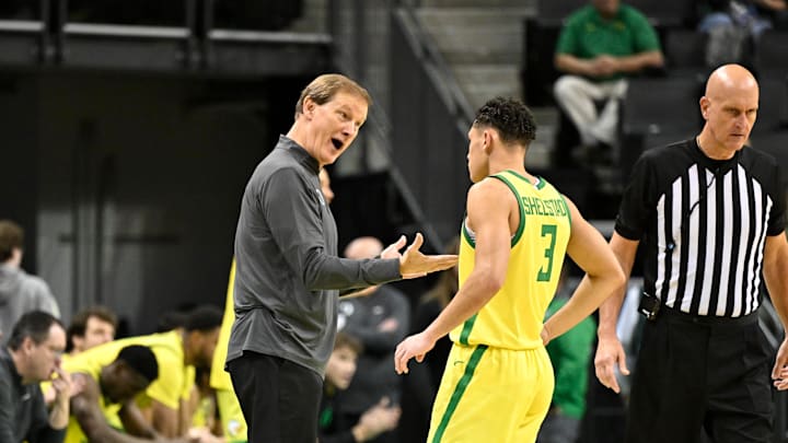 Jan 2, 2025; Eugene, Oregon, USA; Oregon Ducks head coach Dana Altman with instruction for Oregon Ducks guard Jackson Shelstad (3) during the second half against the Illinois Fighting Illini at Matthew Knight Arena. Mandatory Credit: Craig Strobeck-Imagn Images Jan 2, 2025; Eugene, Oregon, USA; Oregon Ducks head coach Dana Altman with instruction for Oregon Ducks guard Jackson Shelstad (3) during the second half against the Illinois Fighting Illini at Matthew Knight Arena. Mandatory Credit: Craig Strobeck-Imagn Images