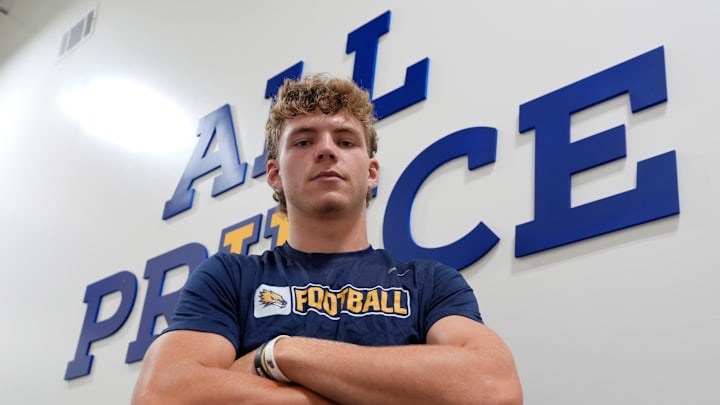 Prince Avenue Christian junior QB Ben Musser, one of our top 20 area football players, poses for a portrait at his high school.