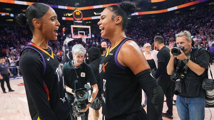 Phoenix Mercury teammates Satou Sabally (0) and DeWanna Bonner (14) celebrate their 86-81 WNBA semifinal playoff series win over the Minnesota Lynx at PHX Arena on Sept. 28, 2025.