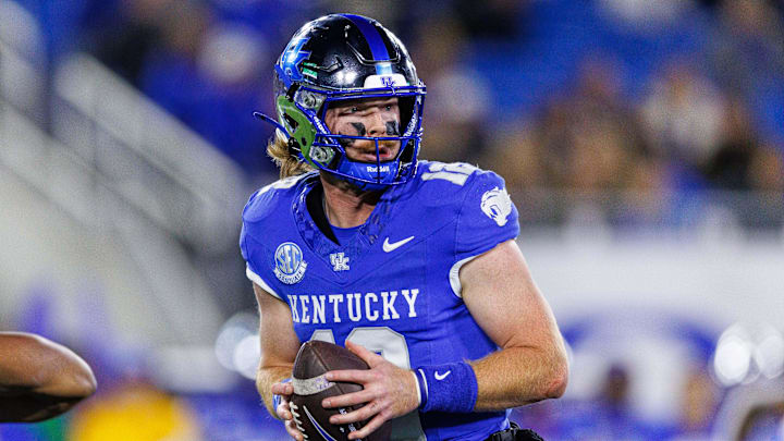 Oct 26, 2024; Lexington, Kentucky, USA; Kentucky Wildcats quarterback Brock Vandagriff (12) looks down the field during the second quarter against the Auburn Tigers at Kroger Field. Mandatory Credit: Jordan Prather-Imagn Images