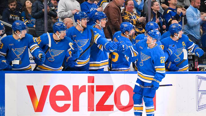 Mar 28, 2026; St. Louis, Missouri, USA; St. Louis Blues center Pius Suter (22) is congratulated by teammates after scoring a short handed goal against the Toronto Maple Leafs during the third period at Enterprise Center. Mandatory Credit: Jeff Curry-Imagn Images