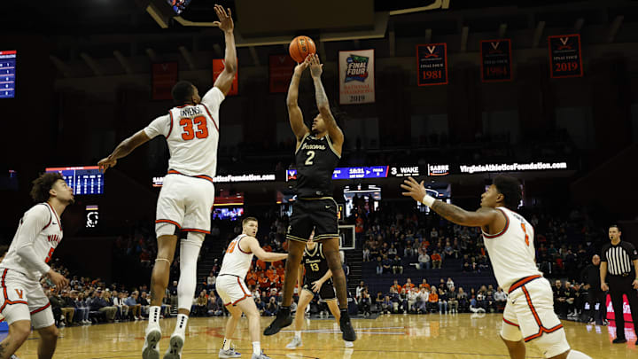 Mar 3, 2026; Charlottesville, Virginia, USA; Wake Forest Demon Deacons forward Juke Harris (2) shoots the ball over Virginia Cavaliers center Ugonna Onyenso (33) in the first half at John Paul Jones Arena. Mandatory Credit: Geoff Burke-Imagn Images
