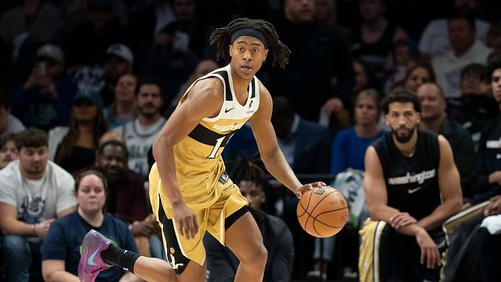 Nov 19, 2025; Minneapolis, Minnesota, USA; Washington Wizards guard Tre Johnson (12) dribbles the ball against the Minnesota Timberwolves in the second half at Target Center. Mandatory Credit: Jesse Johnson-Imagn Images