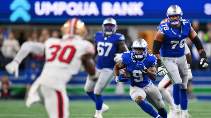 Oct 10, 2024; Seattle, Washington, USA; Seattle Seahawks running back Kenneth Walker III (9) carries the ball against the San Francisco 49ers during the second half at Lumen Field. Mandatory Credit: Steven Bisig-Imagn Images