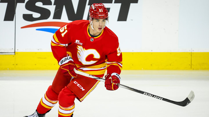 Sep 21, 2025; Calgary, Alberta, CAN; Calgary Flames right wing Matvei Gridin (51) skates during the warmup period against the Edmonton Oilers at Scotiabank Saddledome. Mandatory Credit: Sergei Belski-Imagn Images