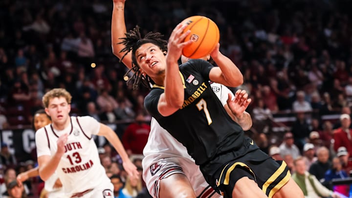 Jan 3, 2026; Columbia, South Carolina, USA; Vanderbilt Commodores guard Chandler Bing (7) drives against the South Carolina Gamecocks in the second half at Colonial Life Arena. Mandatory Credit: Jeff Blake-Imagn Images Jan 3, 2026; Columbia, South Carolina, USA; Vanderbilt Commodores guard Chandler Bing (7) drives against the South Carolina Gamecocks in the second half at Colonial Life Arena. Mandatory Credit: Jeff Blake-Imagn Images