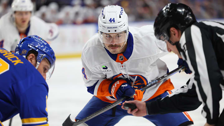 Mar 31, 2026; Buffalo, New York, USA;  New York Islanders center Jean-Gabriel Pageau (44) and Buffalo Sabres center Sam Carrick (10) wait for the face-off during the first period at KeyBank Center. Mandatory Credit: Timothy T. Ludwig-Imagn Images