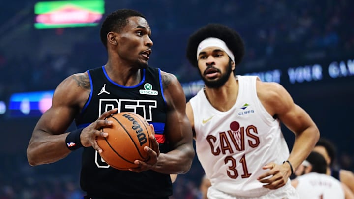 Jan 27, 2025; Cleveland, Ohio, USA; Detroit Pistons center Jalen Duren (0) drives to the basket against Cleveland Cavaliers center Jarrett Allen (31) during the first quarter at Rocket Mortgage FieldHouse. Mandatory Credit: Ken Blaze-Imagn Images
