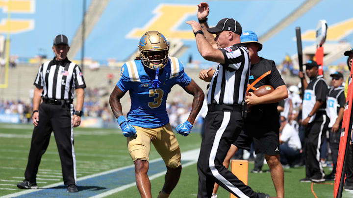 UCLA Bruins wide receiver Kwazi Gilmer (3) reacts after scoring a touchdown against Penn State Nittany Lions during the first quarter at Rose Bowl. Mandatory Credit: Kiyoshi Mio-Imagn Images