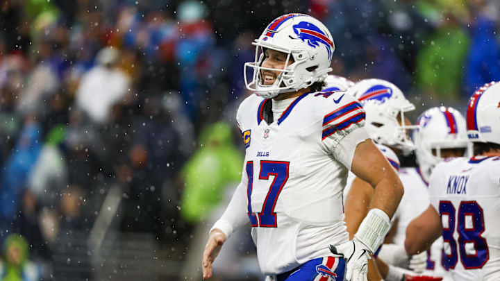 Buffalo Bills quarterback Josh Allen celebrates after throwing a touchdown pass against the Seattle Seahawks