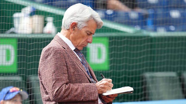 Sep 10, 2023; Toronto, Ontario, CAN; Toronto Blue Jays sportscaster and Sportsnet commentator Buck Martinez writes in his notebook during batting practice before a game against the Kansas City Royals at Rogers Centre. Mandatory Credit: Nick Turchiaro-Imagn Images