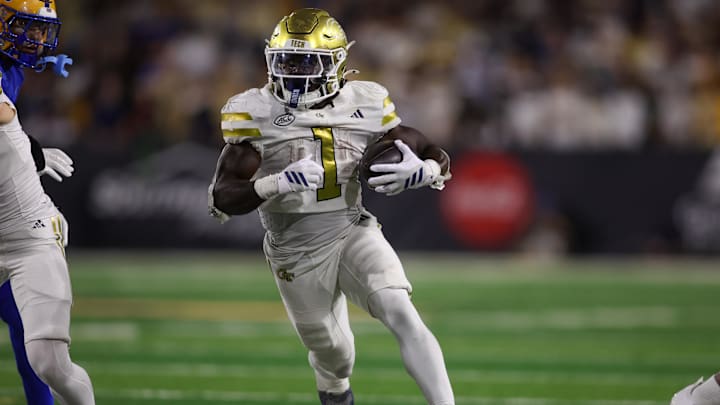 Nov 22, 2025; Atlanta, Georgia, USA; Georgia Tech Yellow Jackets running back Jamal Haynes (1) runs the ball against the Pittsburgh Panthers in the fourth quarter at Bobby Dodd Stadium at Hyundai Field. Mandatory Credit: Brett Davis-Imagn Images Nov 22, 2025; Atlanta, Georgia, USA; Georgia Tech Yellow Jackets running back Jamal Haynes (1) runs the ball against the Pittsburgh Panthers in the fourth quarter at Bobby Dodd Stadium at Hyundai Field. Mandatory Credit: Brett Davis-Imagn Images