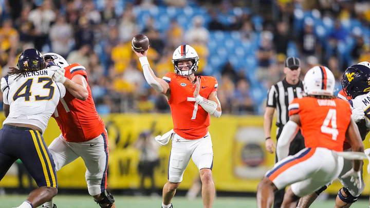 Sep 19, 2026; Charlotte, North Carolina, USA; Virginia Cavaliers quarterback Beau Pribula (7) throws a pass to Virginia Cavaliers wide receiver Jacquon Gibson (4) during the fourth quarter against the West Virginia Mountaineers at Bank of America Stadium. Mandatory Credit: Ben Queen-Imagn Images Sep 19, 2026; Charlotte, North Carolina, USA; Virginia Cavaliers quarterback Beau Pribula (7) throws a pass to Virginia Cavaliers wide receiver Jacquon Gibson (4) during the fourth quarter against the West Virginia Mountaineers at Bank of America Stadium. Mandatory Credit: Ben Queen-Imagn Images