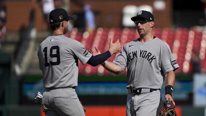 Aug 17, 2025; St. Louis, Missouri, USA;  New York Yankees first baseman Paul Goldschmidt (48) celebrates with third baseman Ryan McMahon (19) after the Yankees defeated the St. Louis Cardinals and swept the series at Busch Stadium. Mandatory Credit: Jeff Curry-Imagn Images