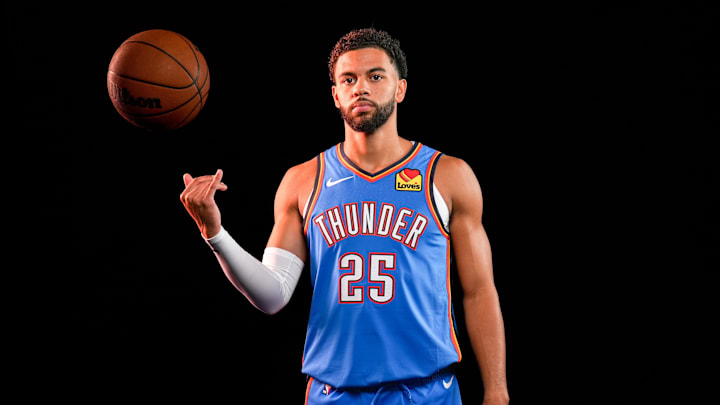 Oklahoma City Thunder guard Ajay Mitchell (25) poses for a photo shoot during Thunder media day at Paycom Center in Oklahoma City on Monday, Sept. 29, 2025.