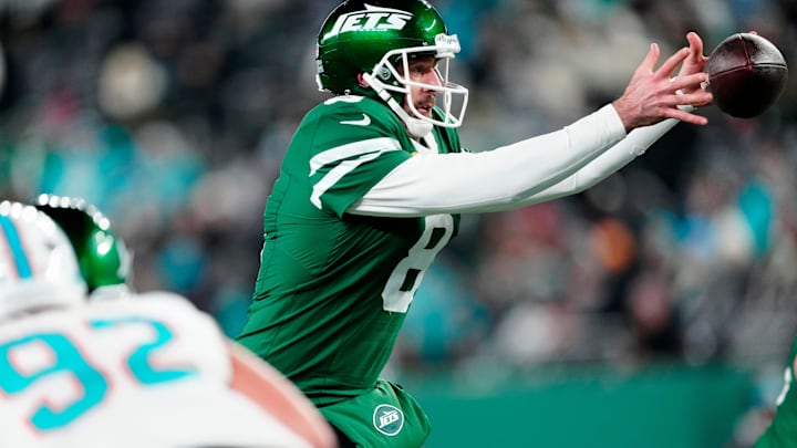 New York Jets quarterback Aaron Rodgers (8) grabs the snap, Sunday January 5, 2025, in East Rutherford. New York Jets quarterback Aaron Rodgers (8) grabs the snap, Sunday January 5, 2025, in East Rutherford.