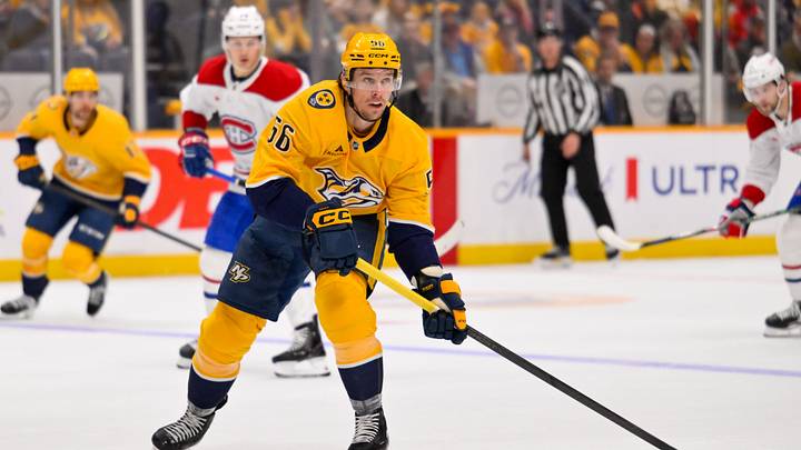 Mar 28, 2026; Nashville, Tennessee, USA;  Nashville Predators left wing Erik Haula (56) skates with the puck against the Montreal Canadiens during the first period Gat Bridgestone Arena. Mandatory Credit: Steve Roberts-Imagn Images