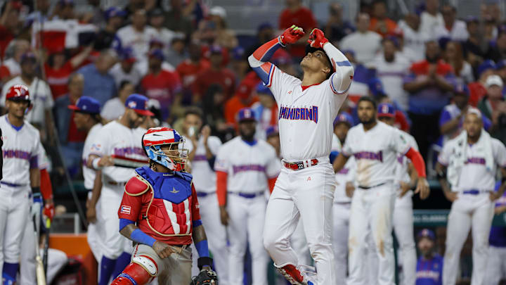 Mar 15, 2023; Miami, Florida, USA; Dominican Republic left fielder Juan Soto (22) celebrates after scoring during the third inning against Puerto Rico at LoanDepot Park. Mandatory Credit: Sam Navarro-Imagn Images