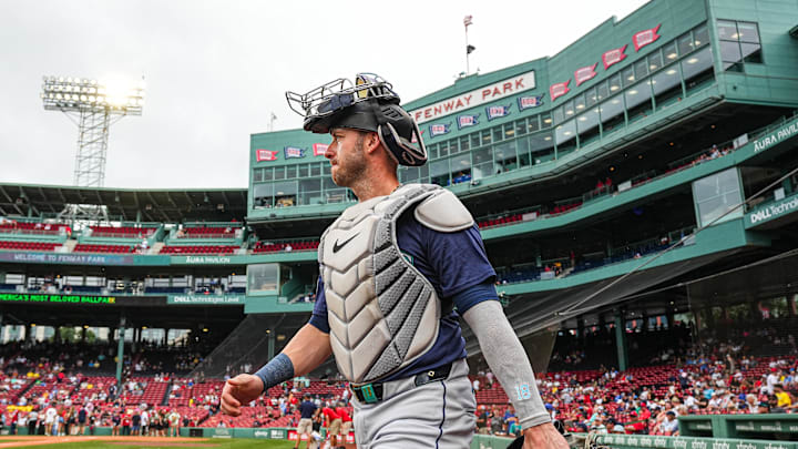 Seattle Mariners catcher Mitch Garver (18) walks to the bullpen before the start of the game against the Boston Red Sox at Fenway Park in 2024.