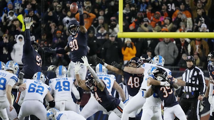 Jan 4, 2026; Chicago, Illinois, USA; Chicago Bears defensive end Dominique Robinson (90) attempts to block the game-winning field goal made by Detroit Lions place kicker Jake Bates (39) during the second half at Soldier Field. Mandatory Credit: David Banks-Imagn Images Jan 4, 2026; Chicago, Illinois, USA; Chicago Bears defensive end Dominique Robinson (90) attempts to block the game-winning field goal made by Detroit Lions place kicker Jake Bates (39) during the second half at Soldier Field. Mandatory Credit: David Banks-Imagn Images