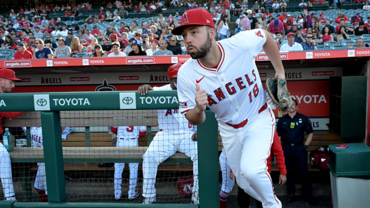 Jun 19, 2024; Anaheim, California, USA;  Los Angeles Angels first baseman Nolan Schanuel (18) runs on to the field for the game against the Milwaukee Brewers at Angel Stadium. Mandatory Credit: Jayne Kamin-Oncea-USA TODAY Sports