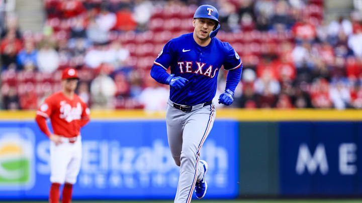 Cincinnati, Ohio, USA; Texas Rangers outfielder Wyatt Langford (36) runs the bases after hitting a solo home run in the first inning against the Cincinnati Reds at Great American Ball Park. Cincinnati, Ohio, USA; Texas Rangers outfielder Wyatt Langford (36) runs the bases after hitting a solo home run in the first inning against the Cincinnati Reds at Great American Ball Park.