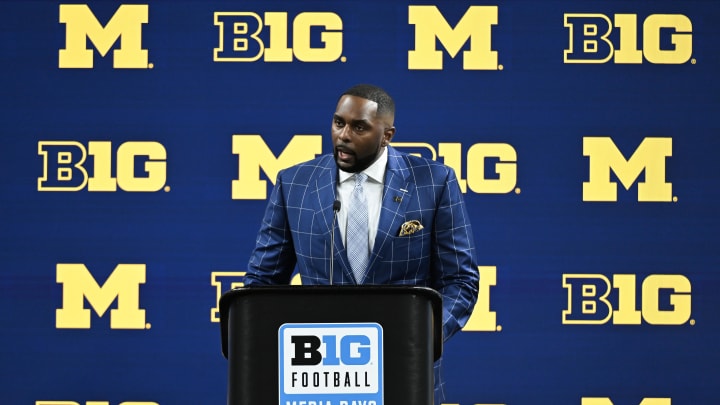 Jul 25, 2024; Indianapolis, IN, USA; Michigan Wolverines head coach Sherrone Moore speaks to the media during the Big 10 football media day at Lucas Oil Stadium. Mandatory Credit: Robert Goddin-USA TODAY Sports Jul 25, 2024; Indianapolis, IN, USA; Michigan Wolverines head coach Sherrone Moore speaks to the media during the Big 10 football media day at Lucas Oil Stadium. Mandatory Credit: Robert Goddin-USA TODAY Sports