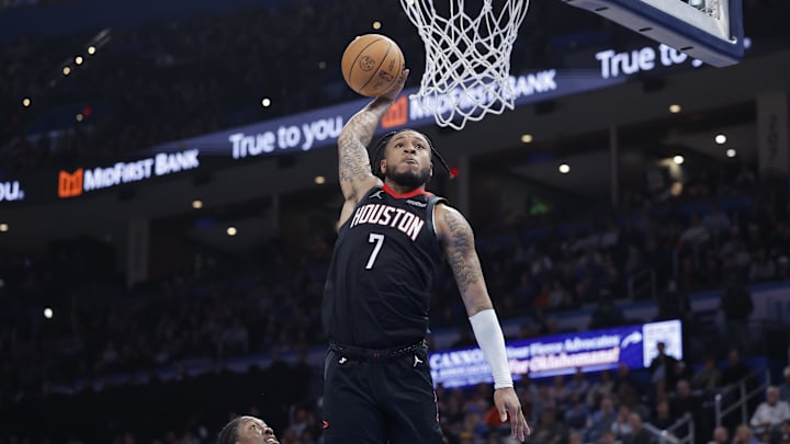 Mar 3, 2025; Oklahoma City, Oklahoma, USA; Houston Rockets forward Cam Whitmore (7) goes up for a dunk against the Oklahoma City Thunder during the second half at Paycom Center. Mandatory Credit: Alonzo Adams-Imagn Images
