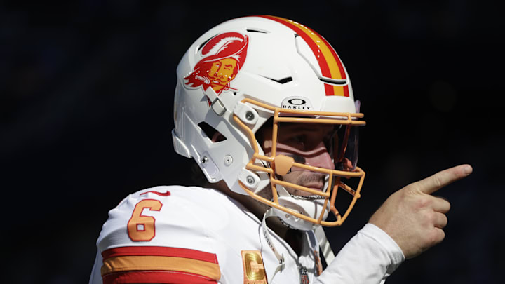 Oct 5, 2025; Seattle, Washington, USA; Tampa Bay quarterback Baker Mayfield (6) wearing the Buccaneers throwback helmets as he warms ups prior to a game against the Seattle Seahawks at Lumen Field. Mandatory Credit: Joe Nicholson-Imagn Images