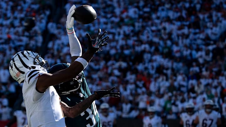 Philadelphia Eagles cornerback Isaiah Rodgers (34) tips a pass intended for Cincinnati Bengals wide receiver Ja'Marr Chase (1) before Philadelphia Eagles safety C.J. Gardner-Johnson (8) intercepts it in the fourth quarter of the NFL game at Paycor Stadium in Cincinnati on Sunday, Oct. 27, 2024. Philadelphia Eagles cornerback Isaiah Rodgers (34) tips a pass intended for Cincinnati Bengals wide receiver Ja'Marr Chase (1) before Philadelphia Eagles safety C.J. Gardner-Johnson (8) intercepts it in the fourth quarter of the NFL game at Paycor Stadium in Cincinnati on Sunday, Oct. 27, 2024.