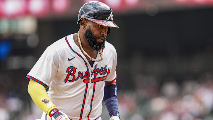 Sep 24, 2025; Cumberland, Georgia, USA; Atlanta Braves designated hitter Marcell Ozuna (20) reacts after hitting a home run against the Washington Nationals during the eighth inning at Truist Park. Mandatory Credit: Dale Zanine-Imagn Images