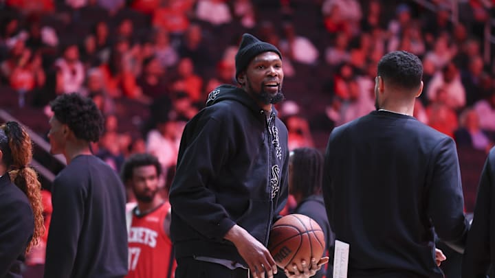 Apr 12, 2026; Houston, Texas, USA; Houston Rockets forward Kevin Durant (7) holds a basketball during a timeout during the second quarter against the Memphis Grizzlies at Toyota Center. Mandatory Credit: Troy Taormina-Imagn Images
