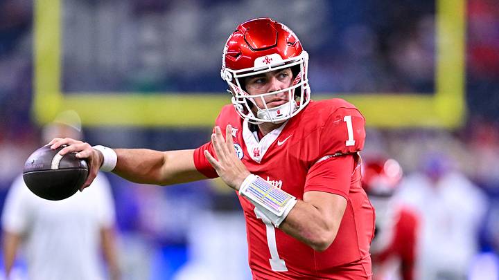 Dec 27, 2025; Houston, TX, USA; Houston Cougars quarterback Conner Weigman (1) warms up prior to the game against the Louisiana State Tigers at NRG Stadium. Mandatory Credit: Maria Lysaker-Imagn Images