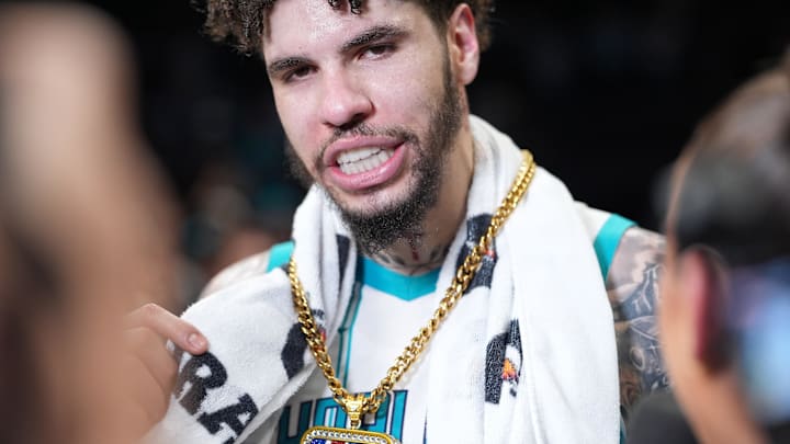 Apr 14, 2026; Charlotte, North Carolina, USA; Charlotte Hornets guard LaMelo Ball (1) is given a prime award after the second half overtime win during the play-in rounds between the Charlotte Hornets and the Miami Heat of the 2026 NBA Playoffs at Spectrum Center. Mandatory Credit: Jim Dedmon-Imagn Images Apr 14, 2026; Charlotte, North Carolina, USA; Charlotte Hornets guard LaMelo Ball (1) is given a prime award after the second half overtime win during the play-in rounds between the Charlotte Hornets and the Miami Heat of the 2026 NBA Playoffs at Spectrum Center. Mandatory Credit: Jim Dedmon-Imagn Images