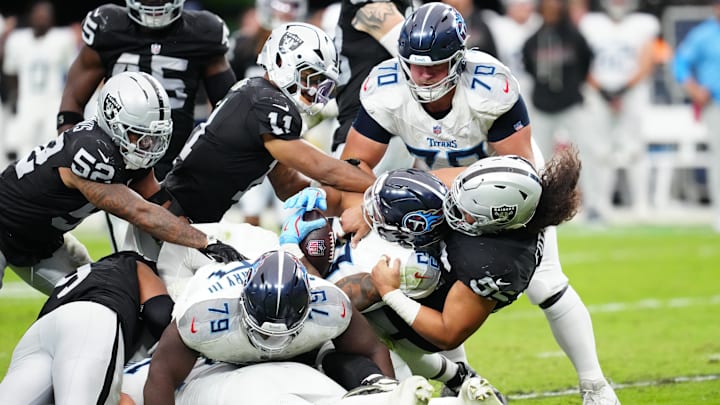 Tennessee Titans running back Tony Pollard is tackled during the second half against the Las Vegas Raiders. Tennessee Titans running back Tony Pollard is tackled during the second half against the Las Vegas Raiders.