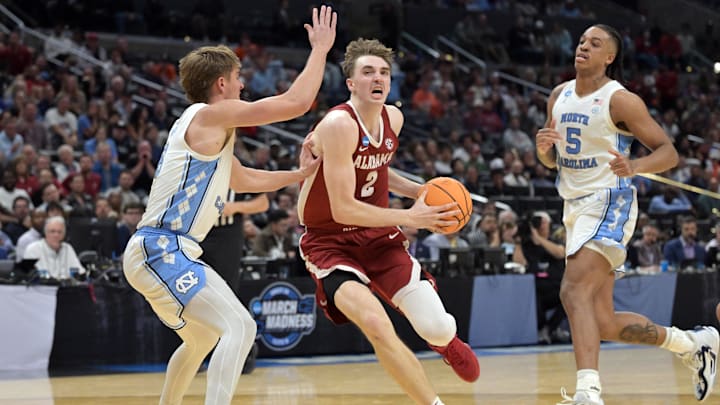 Mar 28, 2024; Los Angeles, CA, USA; Alabama Crimson Tide forward Grant Nelson (2) controls the ball against North Carolina Tar Heels guard Paxson Wojcik (8) in the semifinals of the West Regional of the 2024 NCAA Tournament at Crypto.com Arena. Mandatory Credit: Jayne Kamin-Oncea-Imagn Images Mar 28, 2024; Los Angeles, CA, USA; Alabama Crimson Tide forward Grant Nelson (2) controls the ball against North Carolina Tar Heels guard Paxson Wojcik (8) in the semifinals of the West Regional of the 2024 NCAA Tournament at Crypto.com Arena. Mandatory Credit: Jayne Kamin-Oncea-Imagn Images