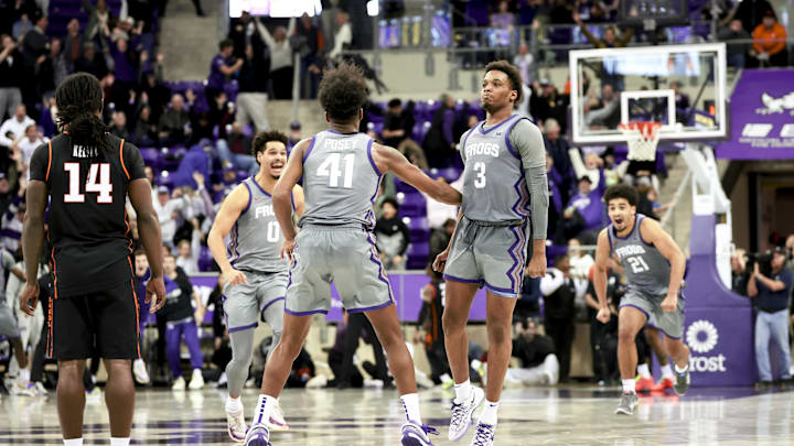 Feb 12, 2025; Fort Worth, Texas, USA; TCU Horned Frogs guard Vasean Allette (3) celebrates with teammates after hitting the game-winning shot during the second half against the Oklahoma State Cowboys at Ed and Rae Schollmaier Arena. Mandatory Credit: Kevin Jairaj-Imagn Images