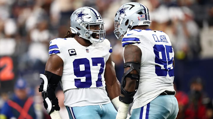 Dallas Cowboys DT Osa Odighizuwa celebrates with DT Kenny Clark after a play against the New York Giants.