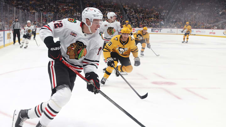 Jan 29, 2026; Pittsburgh, Pennsylvania, USA;  Chicago Blackhawks defenseman Alex Vlasic (72) moves the puck against the Pittsburgh Penguins during the first period at PPG Paints Arena. Mandatory Credit: Charles LeClaire-Imagn Images